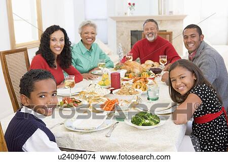 Family All Together At Christmas Dinner View Large Photo Image Picture - Family All Together At Christmas Dinner. Fotosearch