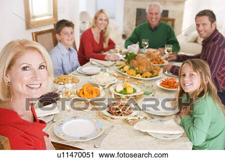 Family All Together At Christmas Dinner View Large Photo Image Stock Image - Family All Together At Christmas Dinner. Fotosearch