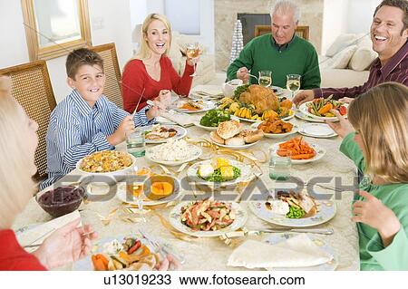 Family All Together At Christmas Dinner View Large Photo Image Stock Image - Family All Together At Christmas Dinner. Fotosearch