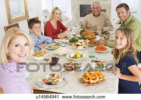 Family All Together At Christmas Dinner View Large Photo Image Stock Image - Family All Together At Christmas Dinner. Fotosearch