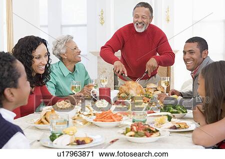 Family All Together At Christmas Dinner View Large Photo Image Stock Image - Family All Together At Christmas Dinner. Fotosearch