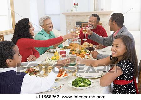 Family All Together At Christmas Dinner View Large Photo Image Stock Photo - Family All Together At Christmas Dinner. Fotosearch