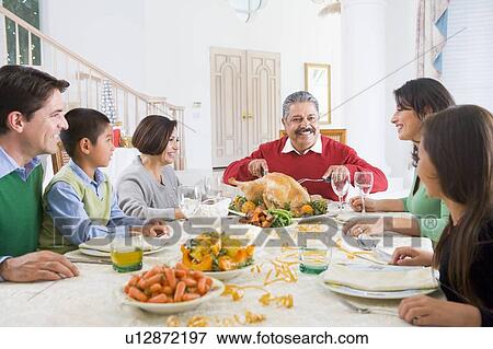 Family All Together At Christmas Dinner View Large Photo Image Stock Photo - Family All Together At Christmas Dinner. Fotosearch