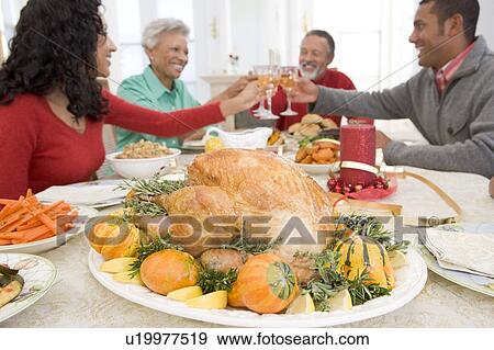 Stock Photo - Family All Together At Christmas Dinner. Fotosearch