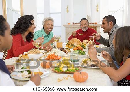 Family All Together At Christmas Dinner View Large Photo Image Stock Photograph - Family All Together At Christmas Dinner. Fotosearch