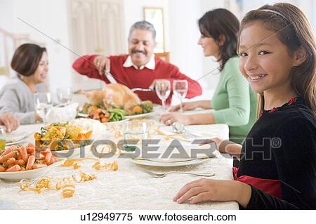 Family All Together At Christmas Dinner View Large Photo Image Stock Photography - Family All Together At Christmas Dinner. Fotosearch