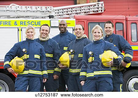 Six firefighters standing by fire engine View Large Photo Image Stock Photo - Six firefighters standing by fire engine. Fotosearch