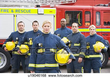 Six firefighters standing by fire engine View Large Photo Image Stock Photo - Six firefighters standing by fire engine. Fotosearch