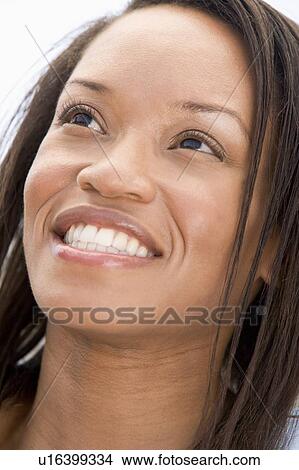 Picture - Head shot of woman smiling. Fotosearch