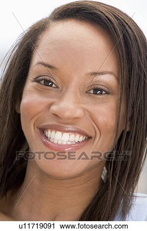 Head shot of woman smiling View Large Photo Image Stock Image - Head shot of woman smiling. Fotosearch