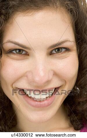 Head shot of woman smiling View Large Photo Image Stock Image - Head shot of woman smiling. Fotosearch