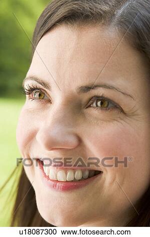 Head shot of woman smiling View Large Photo Image Stock Image - Head shot of woman smiling. Fotosearch