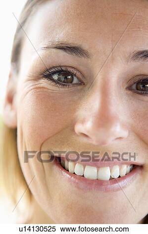 Head shot of woman smiling View Large Photo Image Stock Photography - Head shot of woman smiling. Fotosearch