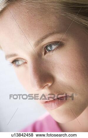 Head shot of woman thinking View Large Photo Image Stock Photo - Head shot of woman thinking. Fotosearch