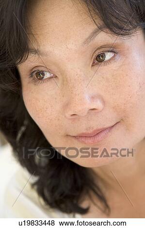 Head shot of woman thinking View Large Photo Image Stock Photo - Head shot of woman thinking. Fotosearch