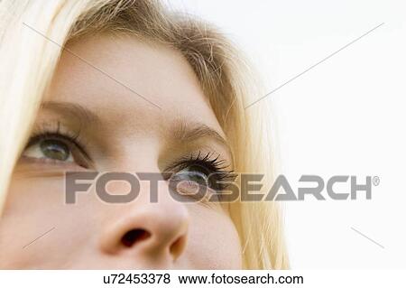 Head shot of woman thinking View Large Photo Image Stock Photo - Head shot of woman thinking. Fotosearch
