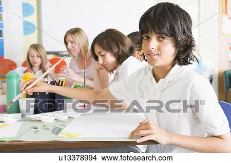 Picture - Students in art class with teacher (depth of field). Fotosearch