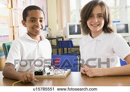 Students in class with electronic project View Large Photo Image Stock Image - Students in class with electronic project. Fotosearch