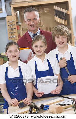 Students in woodworking class with teacher View Large Photo Image Stock Photo - Students in woodworking class with teacher. Fotosearch