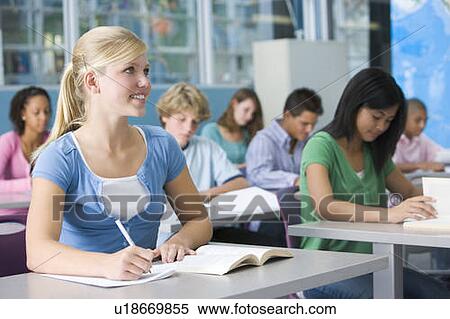 Stock Photography - Students studying in geography class. Fotosearch