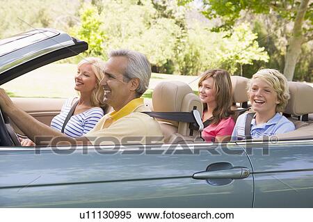 Family in convertible car smiling View Large Photo Image Stock Photography - Family in convertible car smiling. Fotosearch