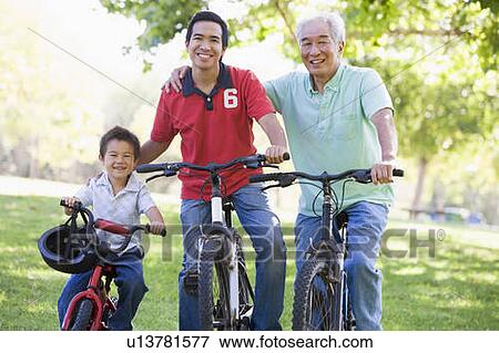 Grandfather son and grandson bike riding. View Large Photo Image Stock Photo - Grandfather son and grandson bike riding.. Fotosearch