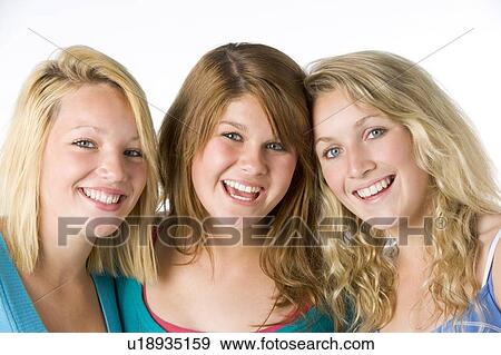 Stock Photo - Portrait Of Teenage Girls. Fotosearch