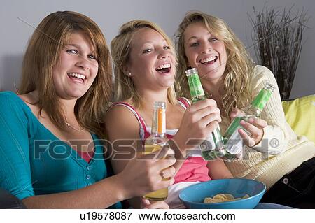 Teenage Girls Enjoying Drinks View Large Photo Image Stock Photo - Teenage Girls Enjoying Drinks. Fotosearch