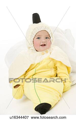 Baby in banana costume View Large Photo Image Stock Photo - Baby in banana costume. Fotosearch