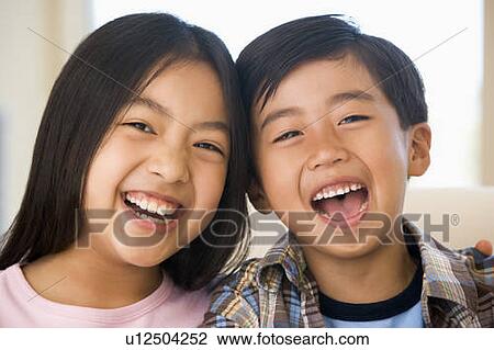 Brother And Sister Laughing View Large Photo Image Stock Image - Brother And Sister Laughing. Fotosearch