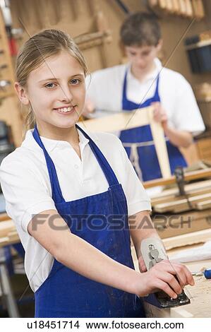 Female student learning woodworking View Large Photo Image Picture - Female student learning woodworking. Fotosearch
