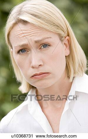 Head shot of sad woman View Large Photo Image Stock Image - Head shot of sad woman. Fotosearch