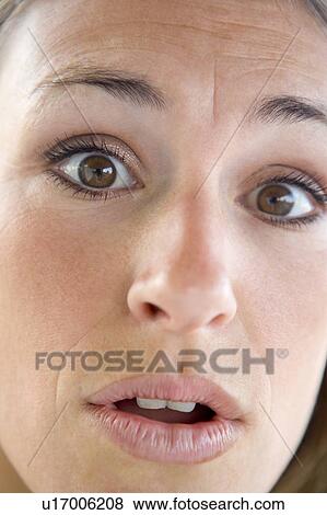Head shot of surprised woman View Large Photo Image Stock Photo - Head shot of surprised woman. Fotosearch