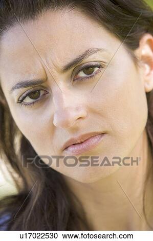 Head shot of woman scowling View Large Photo Image Stock Image - Head shot of woman scowling. Fotosearch