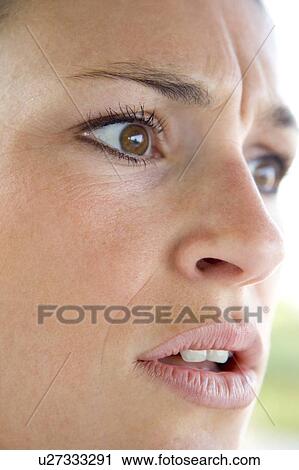 Head shot of woman scowling View Large Photo Image Stock Image - Head shot of woman scowling. Fotosearch