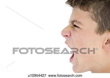 Teenage boy shouting View Large Photo Image Stock Photo - Teenage boy shouting. Fotosearch