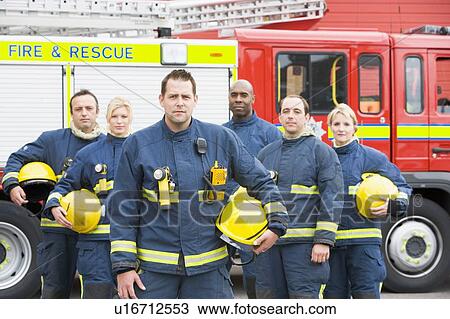 Six firefighters standing by fire engine View Large Photo Image Stock Image - Six firefighters standing by fire engine. Fotosearch