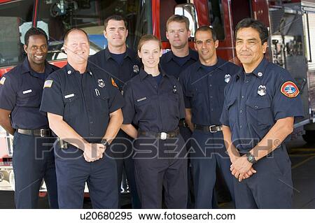 Six firefighters standing in front of fire engine with captain (depth of field) View Large Photo Image Stock Photography - Six firefighters standing in front of fire engine with captain (depth of field). Fotosearch