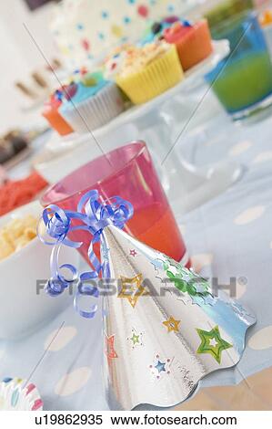 Birthday party table setting with food View Large Photo Image Stock Photography - Birthday party table setting with food. Fotosearch