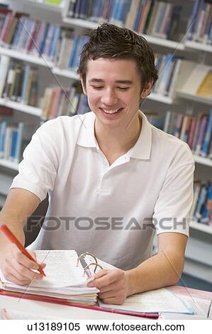 Student writing and studying View Large Photo Image Stock Photography - Student writing and studying. Fotosearch