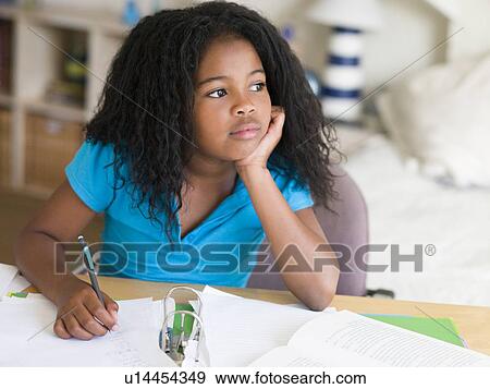 Young Girl Doing Homework View Large Photo Image Stock Photo - Young Girl Doing Homework. Fotosearch