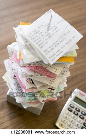 Stock Image - Metal Spike File With Bills. Fotosearch