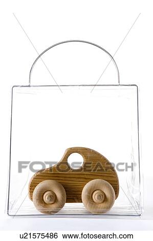 Stock Photograph - Wooden Car In A Bag. Fotosearch