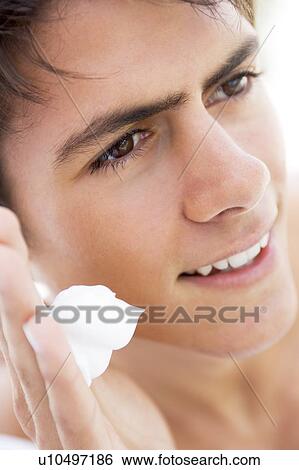 Man putting on shaving cream smiling View Large Photo Image Stock Photograph - Man putting on shaving cream smiling. Fotosearch