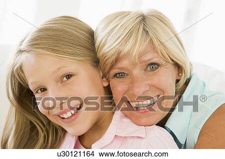 Grandmother and granddaughter smiling View Large Photo Image Picture - Grandmother and granddaughter smiling. Fotosearch