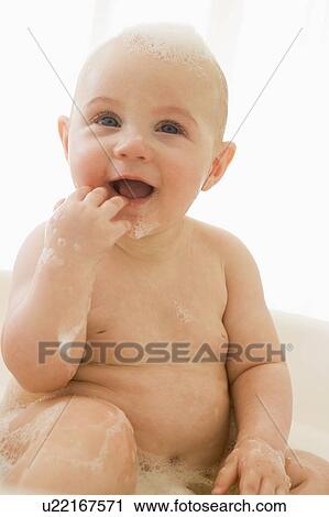 Baby in bubble bath View Large Photo Image Stock Image - Baby in bubble bath. Fotosearch
