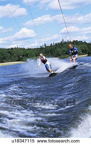 2 people waterskiing View Large Photo Image Stock Photography - 2 people waterskiing. Fotosearch