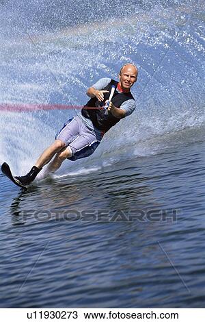 Man waterskiing View Large Photo Image Stock Image - Man waterskiing. Fotosearch
