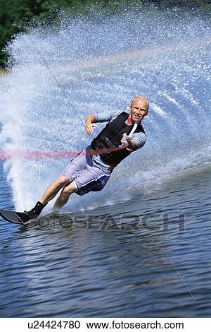 Man waterskiing View Large Photo Image Stock Image - Man waterskiing. Fotosearch
