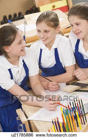 Female students learning woodworking View Large Photo Image Stock Photograph - Female students learning woodworking. Fotosearch